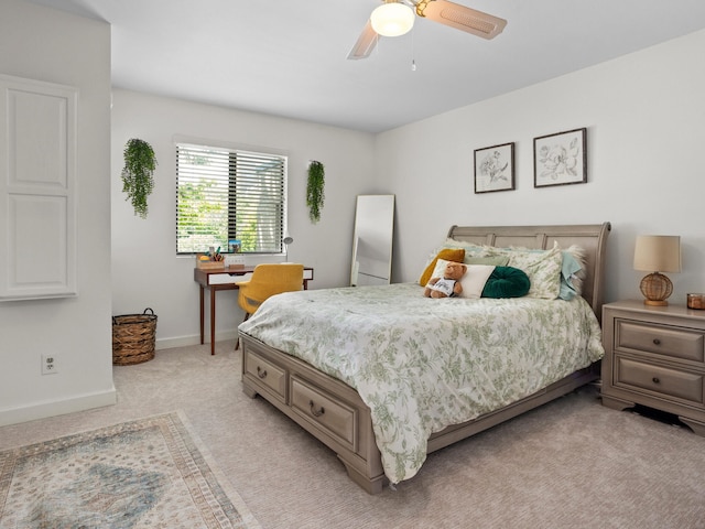 2633 Mccart Ave, Fort Worth, TX 76110 - bedroom featuring light colored carpet, baseboards, and a ceiling fan