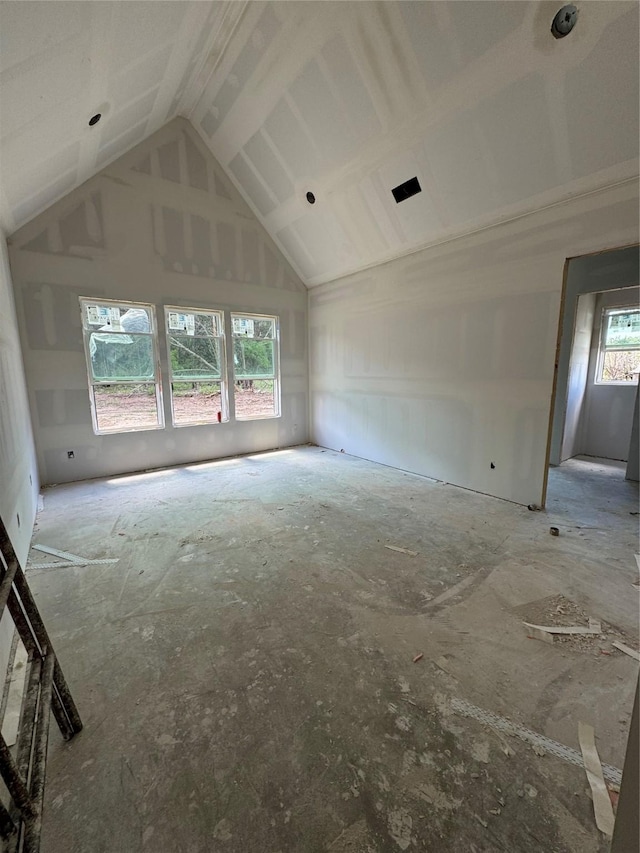 409 Creekside, Weatherford, TX 76087 - unfurnished living room with lofted ceiling