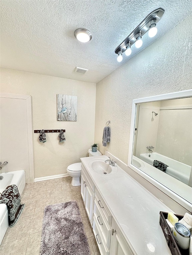 3317 Hummingbird, Denton, TX 76209 - full bath with a bath, vanity, a textured wall, a textured ceiling, and toilet