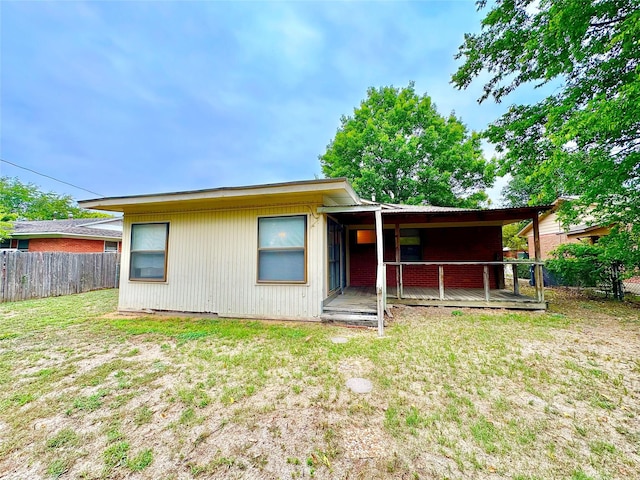 1008 Sierra Dr, Denton, TX 76209 - back of property with a deck