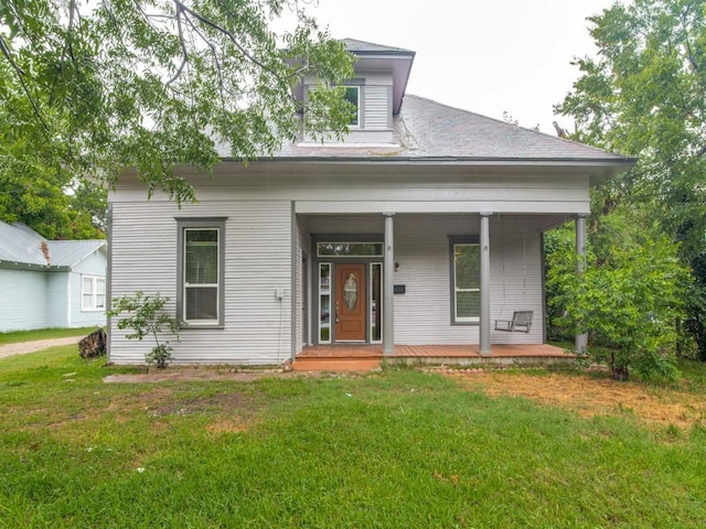 500 N Virginia St, Terrell, TX 75160 - view of front facade with a front lawn and covered porch