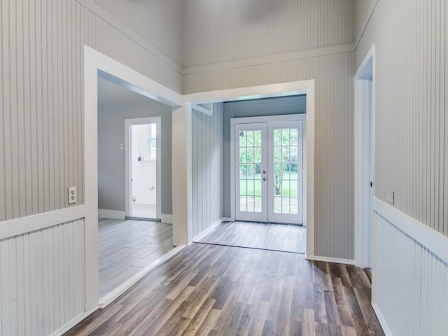 500 N Virginia St, Terrell, TX 75160 - entryway featuring french doors, plenty of natural light, wood finished floors, and baseboards