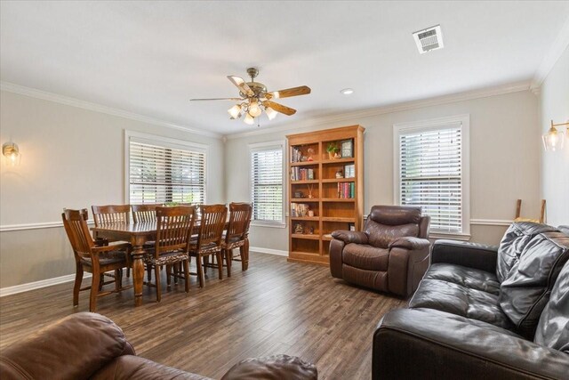 807 Berger Rd, West, TX 76691 - living area with wood finished floors, ornamental molding, baseboards, and ceiling fan