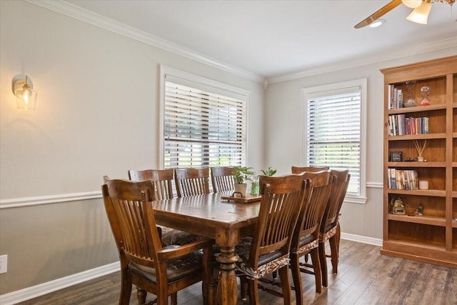 807 Berger Rd, West, TX 76691 - dining area featuring dark wood-style floors, baseboards, crown molding, and a ceiling fan