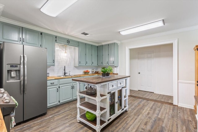 807 Berger Rd, West, TX 76691 - kitchen with wooden counters, stainless steel refrigerator with ice dispenser, a sink, open shelves, and dark wood-style flooring