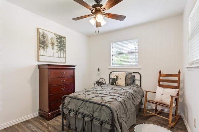 807 Berger Rd, West, TX 76691 - bedroom featuring dark wood-type flooring, baseboards, and a ceiling fan