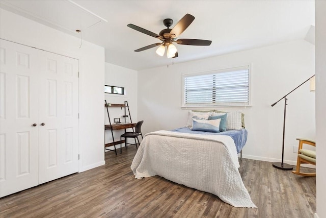 807 Berger Rd, West, TX 76691 - bedroom featuring attic access, wood finished floors, baseboards, and ceiling fan