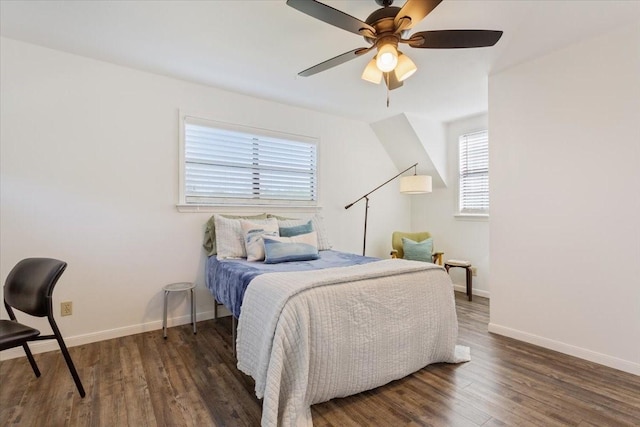 807 Berger Rd, West, TX 76691 - bedroom with multiple windows, wood finished floors, and baseboards
