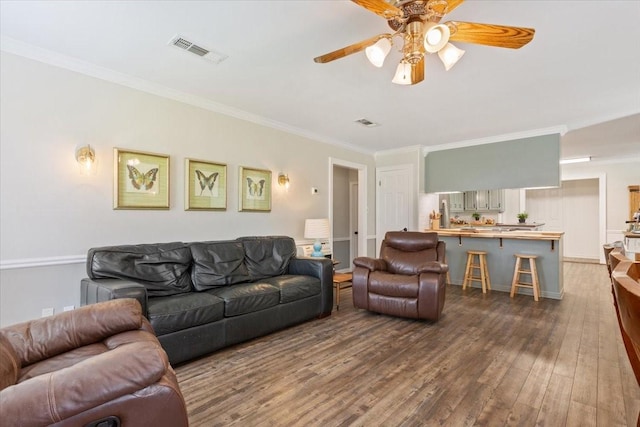 807 Berger Rd, West, TX 76691 - living room with wood finished floors, crown molding, and ceiling fan