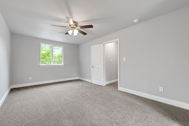 1729 Foster Dr, Arlington, TX 76012 - empty room featuring a ceiling fan, baseboards, and carpet floors