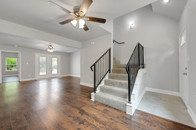 1729 Foster Dr, Arlington, TX 76012 - staircase featuring a ceiling fan, baseboards, and wood finished floors