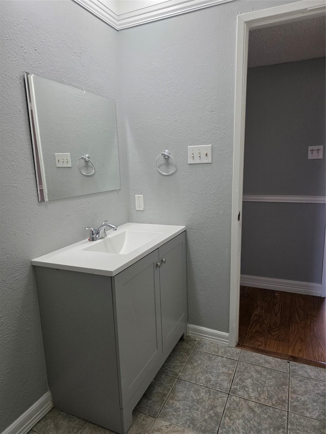 5501 Miami Dr, Rowlett, TX 75088 - bathroom featuring vanity, baseboards, and tile patterned flooring