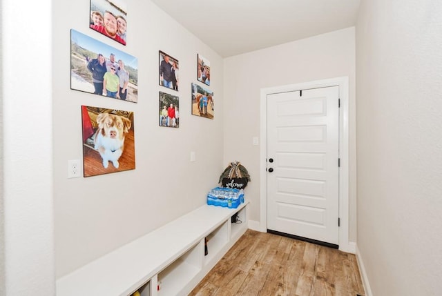 825 Holbrook Rd, Springtown, TX 76082 - mudroom featuring light wood finished floors and baseboards