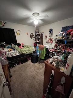 bedroom with carpet and ceiling fan