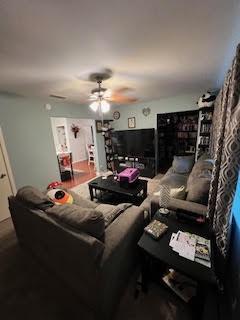 214 Pecos St, Garland, TX 75041 - living room featuring a ceiling fan