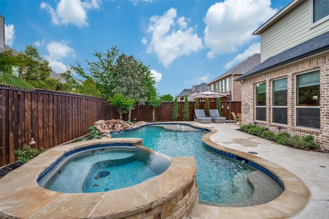 10900 Old Saybrook Ln, Frisco, TX 75033 - view of swimming pool with a fenced backyard, a pool with connected hot tub, and a patio