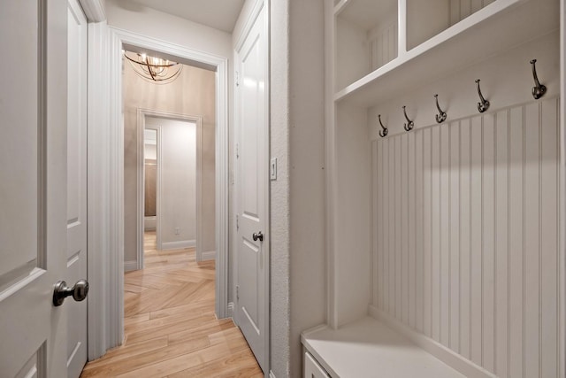 1116 Lake Hills Trl, Roanoke, TX 76262 - mudroom with a chandelier and parquet flooring