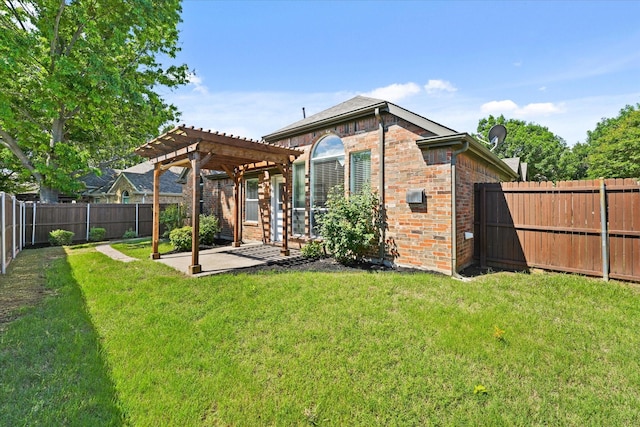 back of house with a pergola, a patio area, and brick siding