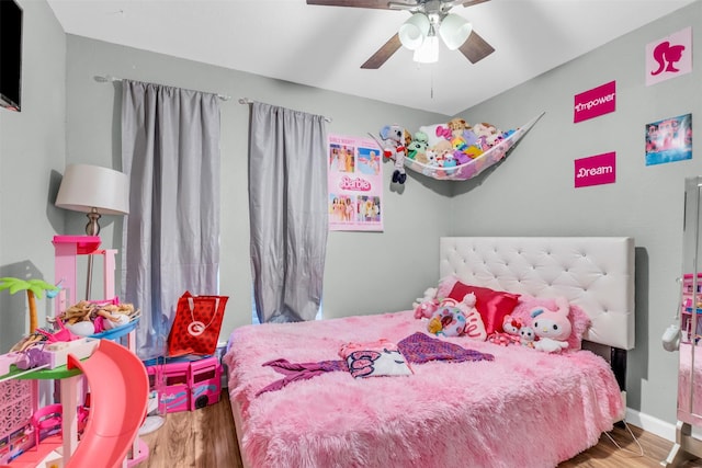 1032 Peach Ln, Desoto, TX 75115 - bedroom featuring wood finished floors and a ceiling fan