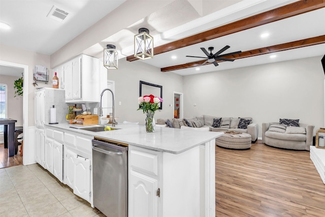 1032 Peach Ln, Desoto, TX 75115 - kitchen with a sink, dishwasher, a peninsula, white cabinets, and recessed lighting