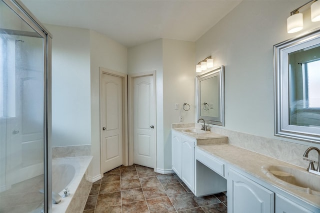 4804 Nocona Dr, Plano, TX 75024 - full bathroom featuring a garden tub, double vanity, and a shower stall