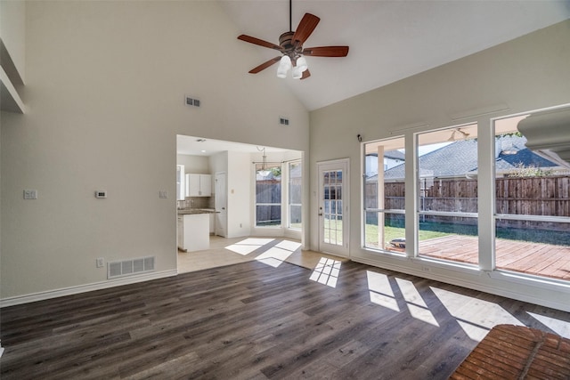 4804 Nocona Dr, Plano, TX 75024 - unfurnished living room featuring light wood finished floors, high vaulted ceiling, ceiling fan, and baseboards
