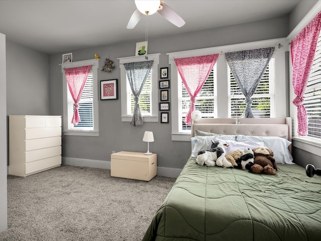 1942 Fairmount Ave, Fort Worth, TX 76110 - bedroom featuring carpet floors, multiple windows, baseboards, and ceiling fan