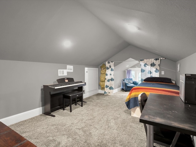 1942 Fairmount Ave, Fort Worth, TX 76110 - bedroom with lofted ceiling, carpet floors, and baseboards