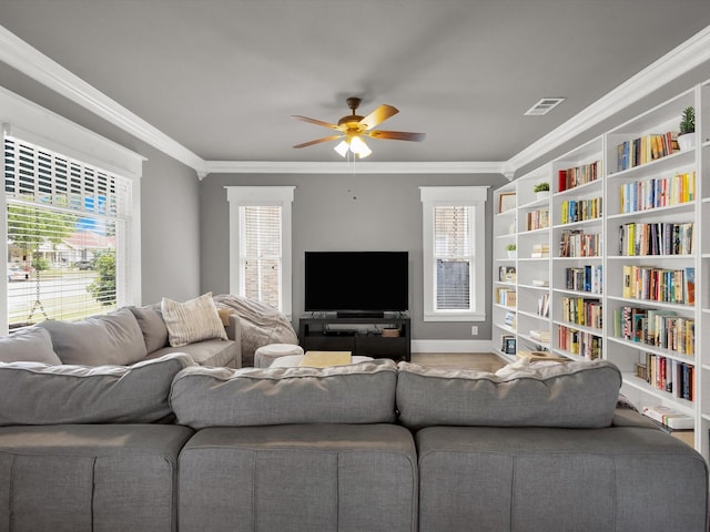 1942 Fairmount Ave, Fort Worth, TX 76110 - living area with ceiling fan, crown molding, and baseboards