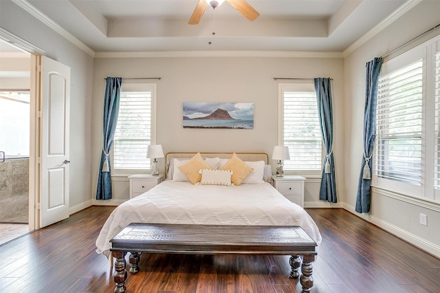 4701 Trevor Trl, Grapevine, TX 76051 - bedroom with a tray ceiling, multiple windows, wood finished floors, and ornamental molding