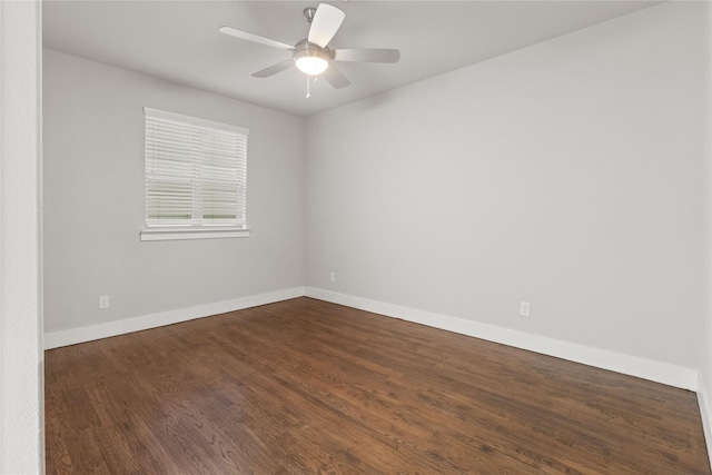 1317 Palm Canyon Dr, Dallas, TX 75204 - empty room featuring dark wood-style floors, baseboards, and a ceiling fan