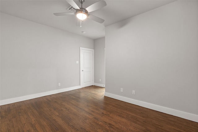 1317 Palm Canyon Dr, Dallas, TX 75204 - empty room featuring baseboards, dark wood-type flooring, and ceiling fan
