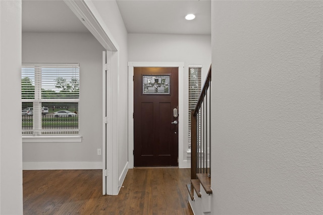 1317 Palm Canyon Dr, Dallas, TX 75204 - entrance foyer with wood finished floors, baseboards, and recessed lighting