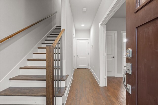 1317 Palm Canyon Dr, Dallas, TX 75204 - foyer with wood finished floors, recessed lighting, stairs, and baseboards
