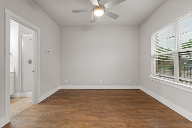 1317 Palm Canyon Dr, Dallas, TX 75204 - empty room with a ceiling fan, wood finished floors, and baseboards