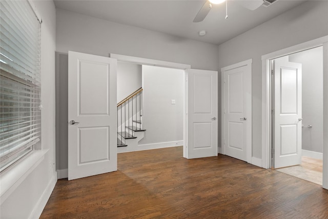 1317 Palm Canyon Dr, Dallas, TX 75204 - hallway featuring wood finished floors, stairs, and baseboards