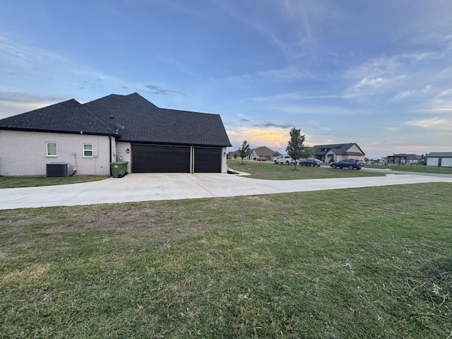 252 Harvard Ln, Springtown, TX 76082 - view of side of home featuring driveway, a yard, a garage, a shingled roof, and cooling unit