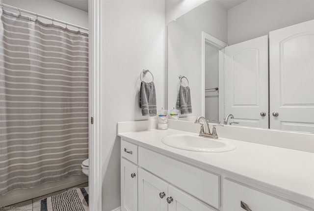 623 Comal Dr, Crandall, TX 75114 - bathroom featuring toilet, vanity, and curtained shower
