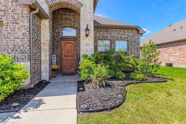 623 Comal Dr, Crandall, TX 75114 - entrance to property with brick siding, a yard, and stone siding