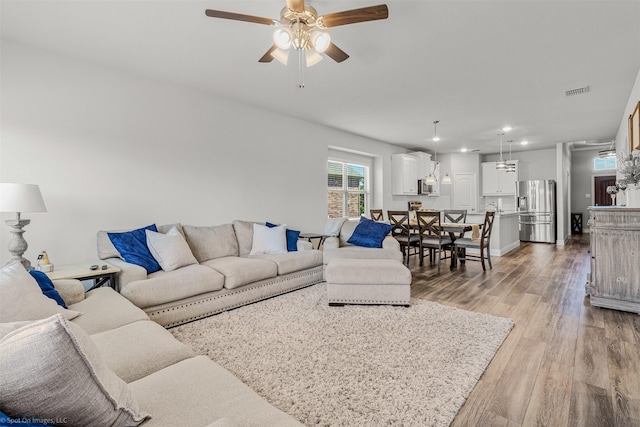 623 Comal Dr, Crandall, TX 75114 - living area with ceiling fan, light wood finished floors, and recessed lighting