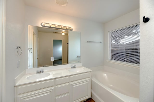 4541 Grainland Ct, Fort Worth, TX 76179 - full bathroom featuring a bath and double vanity