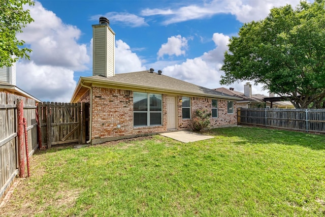 4541 Grainland Ct, Fort Worth, TX 76179 - back of house with brick siding, a chimney, a shingled roof, and a gate