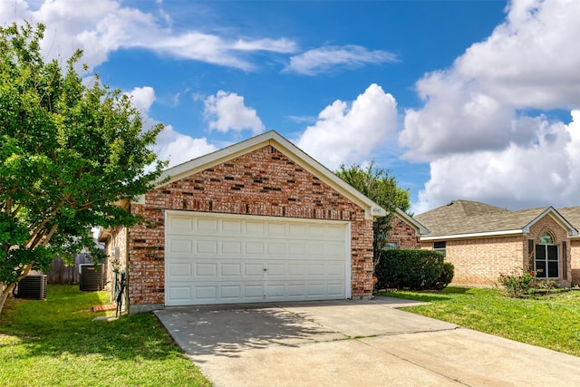 4541 Grainland Ct, Fort Worth, TX 76179 - view of front of house featuring brick siding, concrete driveway, and a front lawn