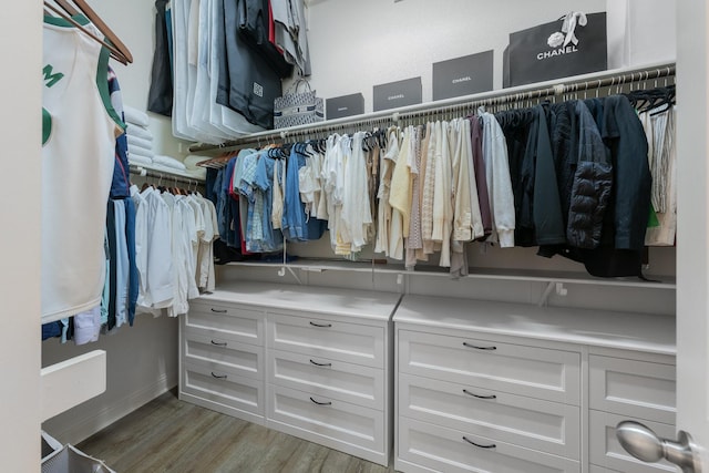 5604 Ridgeson Dr, Mckinney, TX 75071 - walk in closet featuring wood finished floors