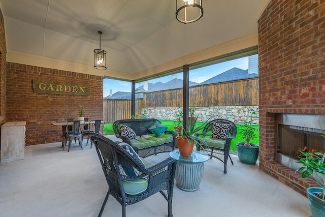 5604 Ridgeson Dr, Mckinney, TX 75071 - view of patio featuring a fenced backyard and an outdoor living space with a fireplace