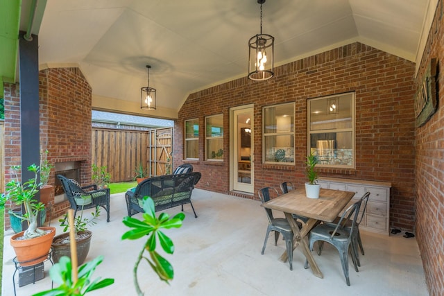 5604 Ridgeson Dr, Mckinney, TX 75071 - view of patio / terrace with fence and an outdoor living space with a fireplace