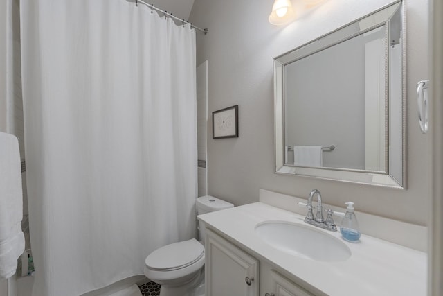 5604 Ridgeson Dr, Mckinney, TX 75071 - bathroom with toilet, vanity, and a shower with shower curtain