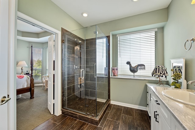 1453 Cattle Baron Ct, Fairview, TX 75069 - full bath with baseboards, a shower stall, vanity, ensuite bath, and wood tiled floors