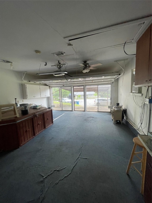 905 Seymore Cir, Denison, TX 75020 - garage with a ceiling fan