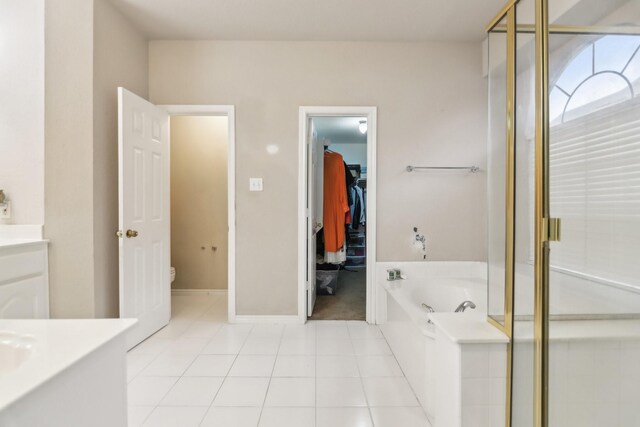 5221 Begonia Ct, Fort Worth, TX 76244 - full bath with toilet, vanity, a garden tub, tile patterned flooring, and a stall shower